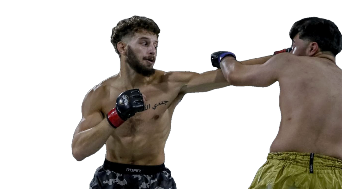 Coach Elijah Halloun landing a jab during a fight